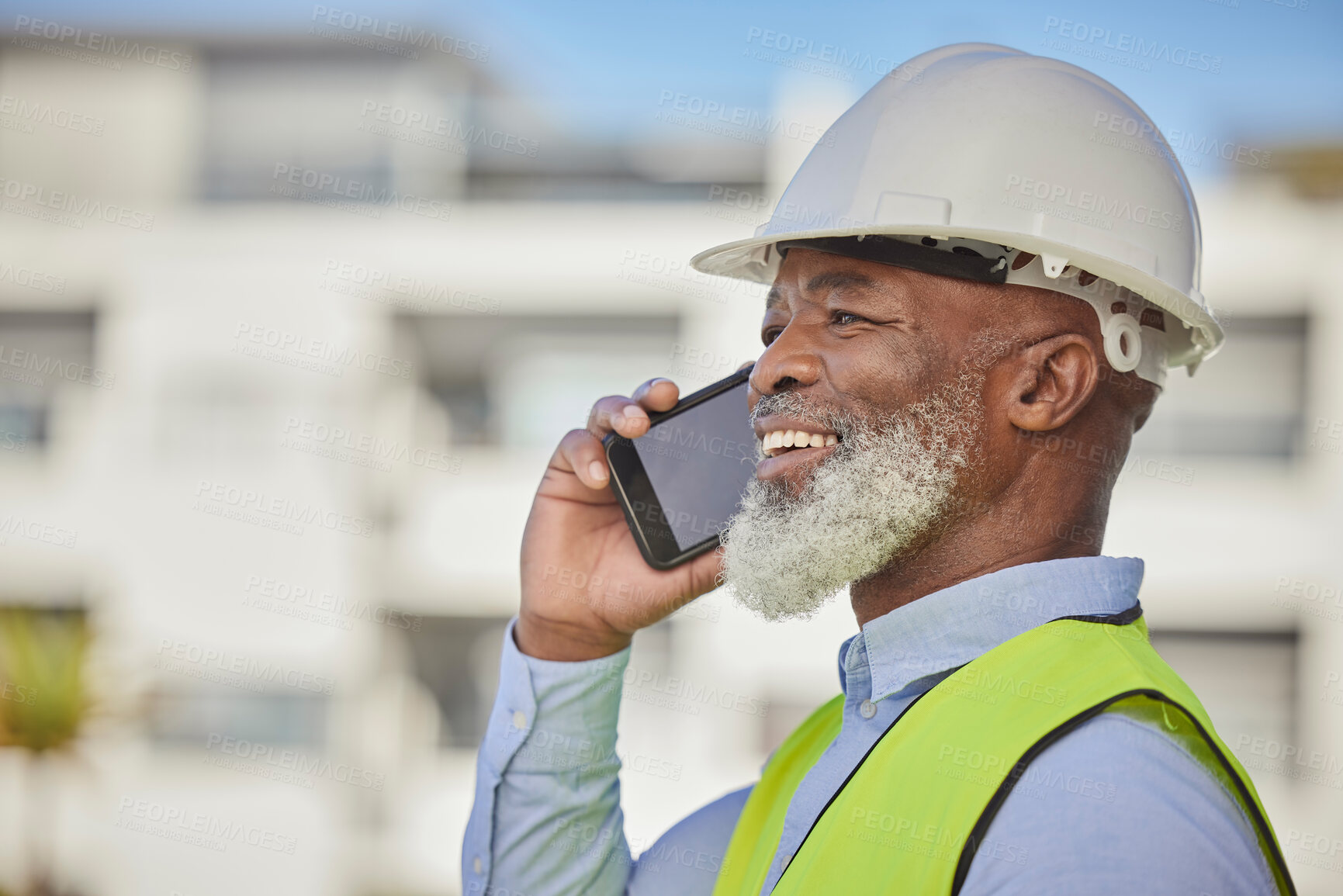 Buy stock photo Black man, architect and phone for construction in the city or building, conversation and discussion. African American male engineer or contractor with smile talking on smartphone in architecture