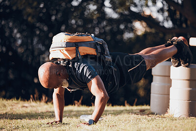 Buy stock photo Pushup, strong and black man at a fitness bootcamp for exercise, workout and sports. Active, bodybuilder and athlete doing a cardio challenge, physical activity and strength routine on a field