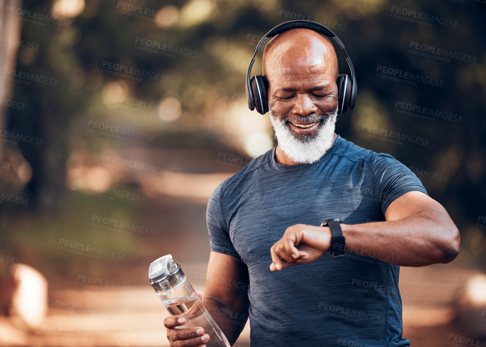 Buy stock photo Black man, music headphones and fitness watch with a water bottle and smile outdoor for cardio time. Senior person outdoor with smartwatch for exercise, workout and training for health and wellness