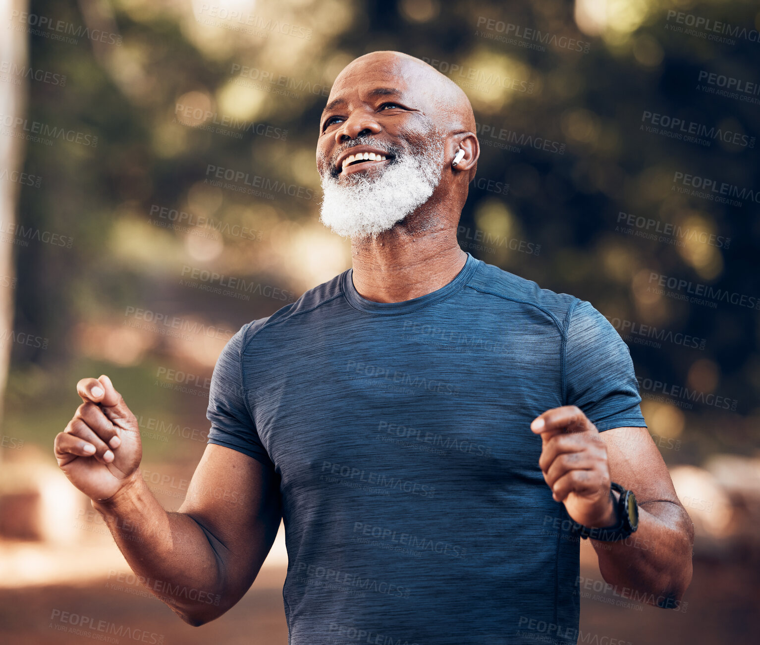 Buy stock photo Park, success and running, winning black man excited and celebration at fitness run in nature with earphones. Music, workout and mature runner with smile and happy to celebrate exercise achievement.