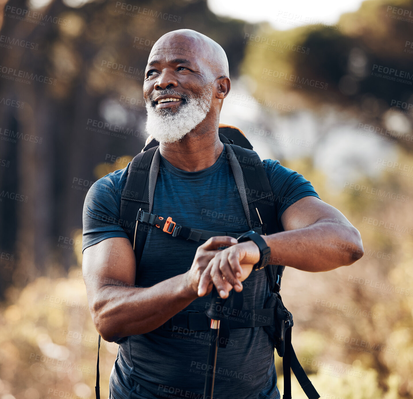 Buy stock photo Hiking, man and smart watch for travel in nature forest for trekking, fitness and cardio exercise. Senior black person with backpack and gps clock outdoor in woods for adventure, health and wellness