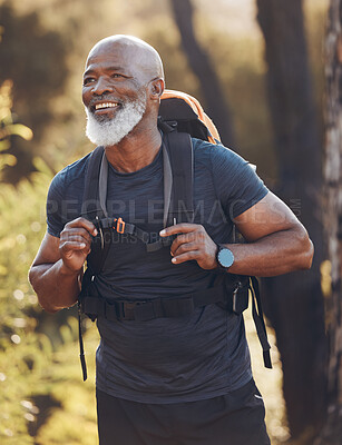Buy stock photo Senior black man hiking in nature for walking fitness, retirement wellness and carbon footprint travel journey in forest. Happy hiker or camper person trekking in woods with health journey and cardio
