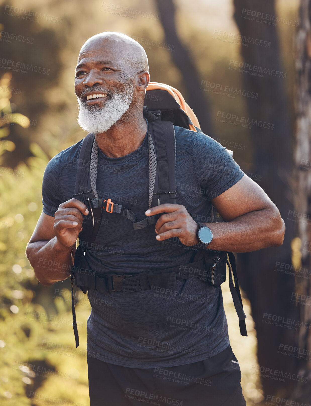 Buy stock photo Senior black man hiking in nature for walking fitness, retirement wellness and carbon footprint travel journey in forest. Happy hiker or camper person trekking in woods with health journey and cardio