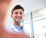 Doctor, man and portrait smile for selfie, profile picture or vlog on the job in healthcare at the hospital. Happy male medical professional smiling for photo, memory or social media post at clinic