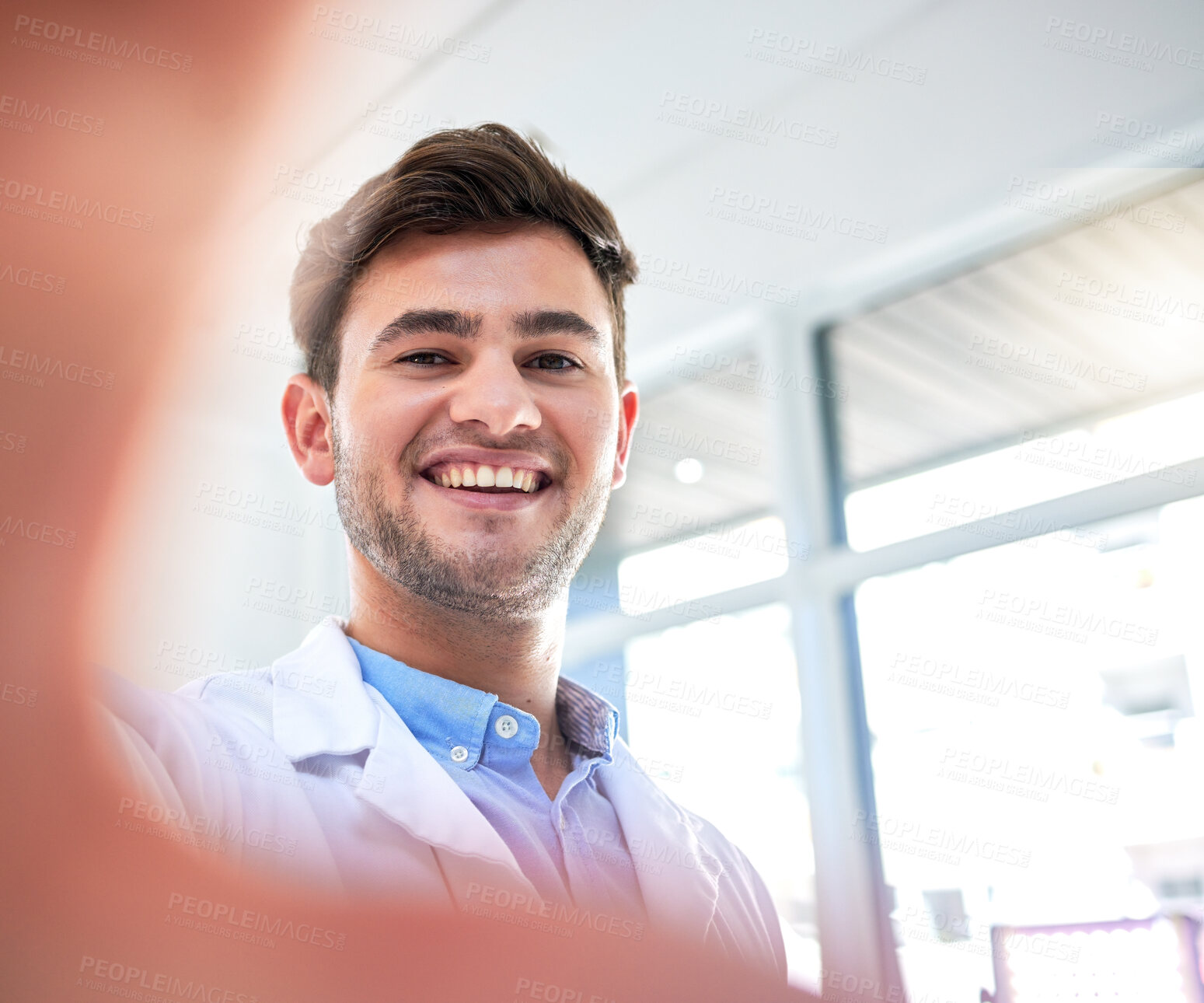 Buy stock photo Doctor, man and portrait smile for selfie, profile picture or vlog on the job in healthcare at the hospital. Happy male medical professional smiling for photo, memory or social media post at clinic