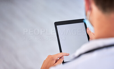 Buy stock photo Doctor, man and hands with tablet on mockup screen above for healthcare research, advertising or marketing at hospital. Hand of male medical expert working on touchscreen display with copy space