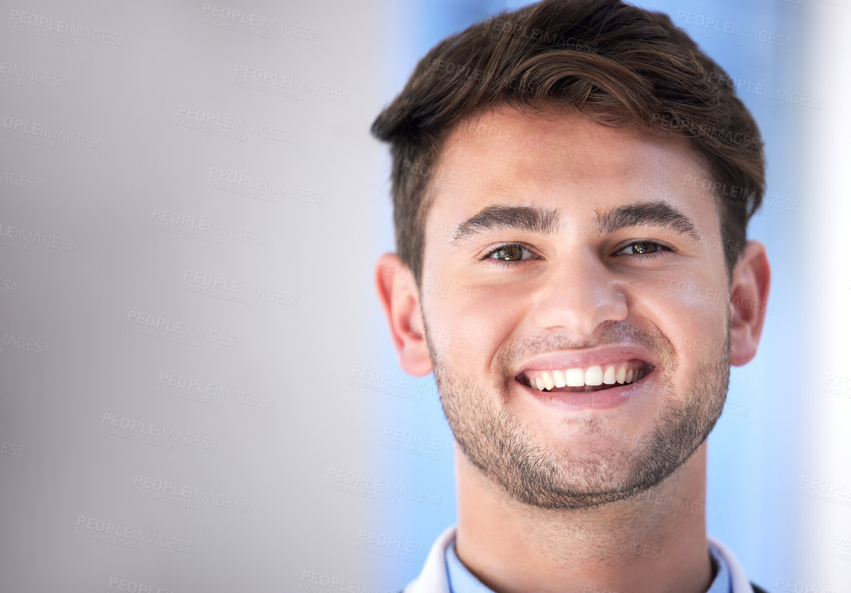 Buy stock photo Man, face and smile in portrait with doctor, healthcare professional and headshot with mockup space. Happy in medicine with young male cardio surgeon, medical care and physician in London hospital