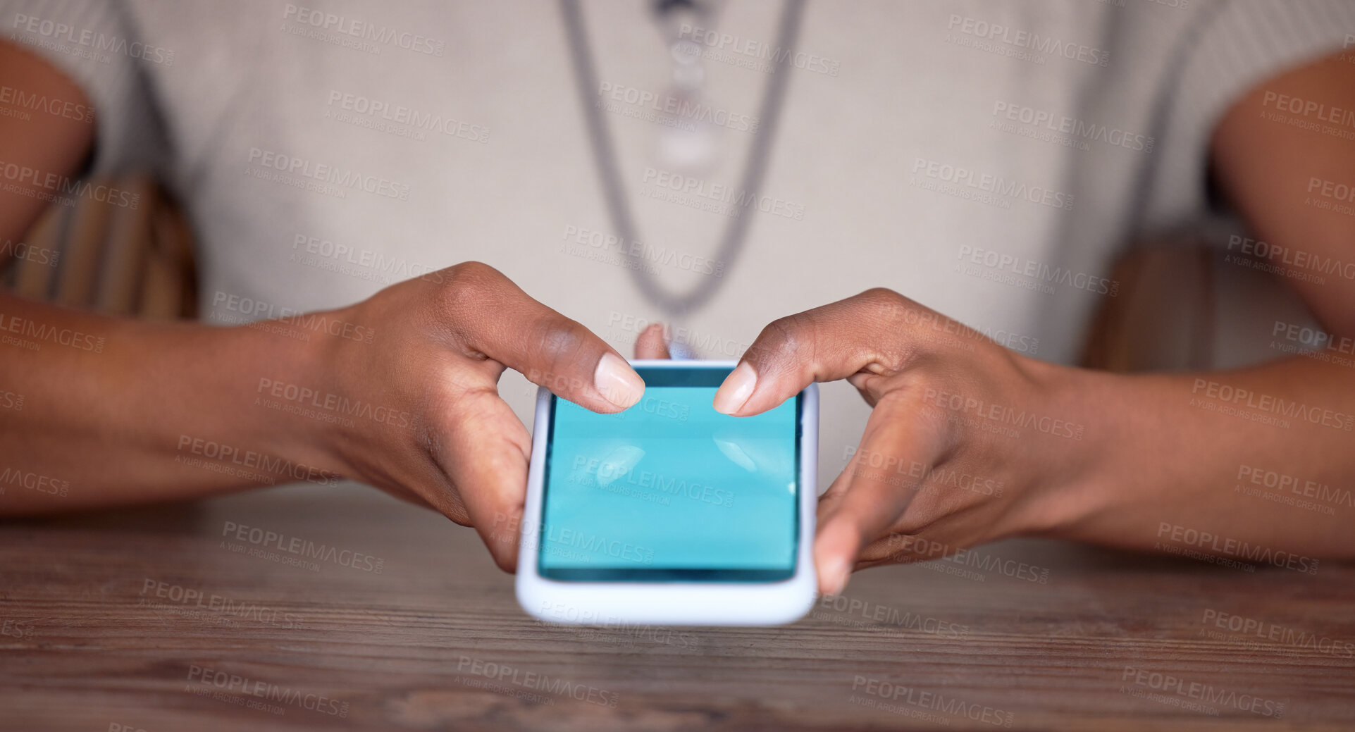 Buy stock photo Black woman, hands and phone with green screen or mockup for social media, communication or mobile app. Hand of African American female browsing, typing or texting in networking on smartphone display