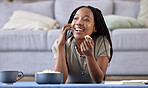 Lounge phone call and black woman with smile, connection and communication with popcorn. African American female, girl and smartphone for conversation, living room and happiness with laugh and joyful