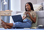 Relax, black woman on floor and laptop for break, streaming movies, happiness and rest. African American female, girl and device in lounge, online reading or search website for funny videos on ground