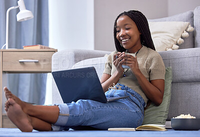 Buy stock photo Relax, black woman on floor and laptop for break, streaming movies, happiness and rest. African American female, girl and device in lounge, online reading or search website for funny videos on ground
