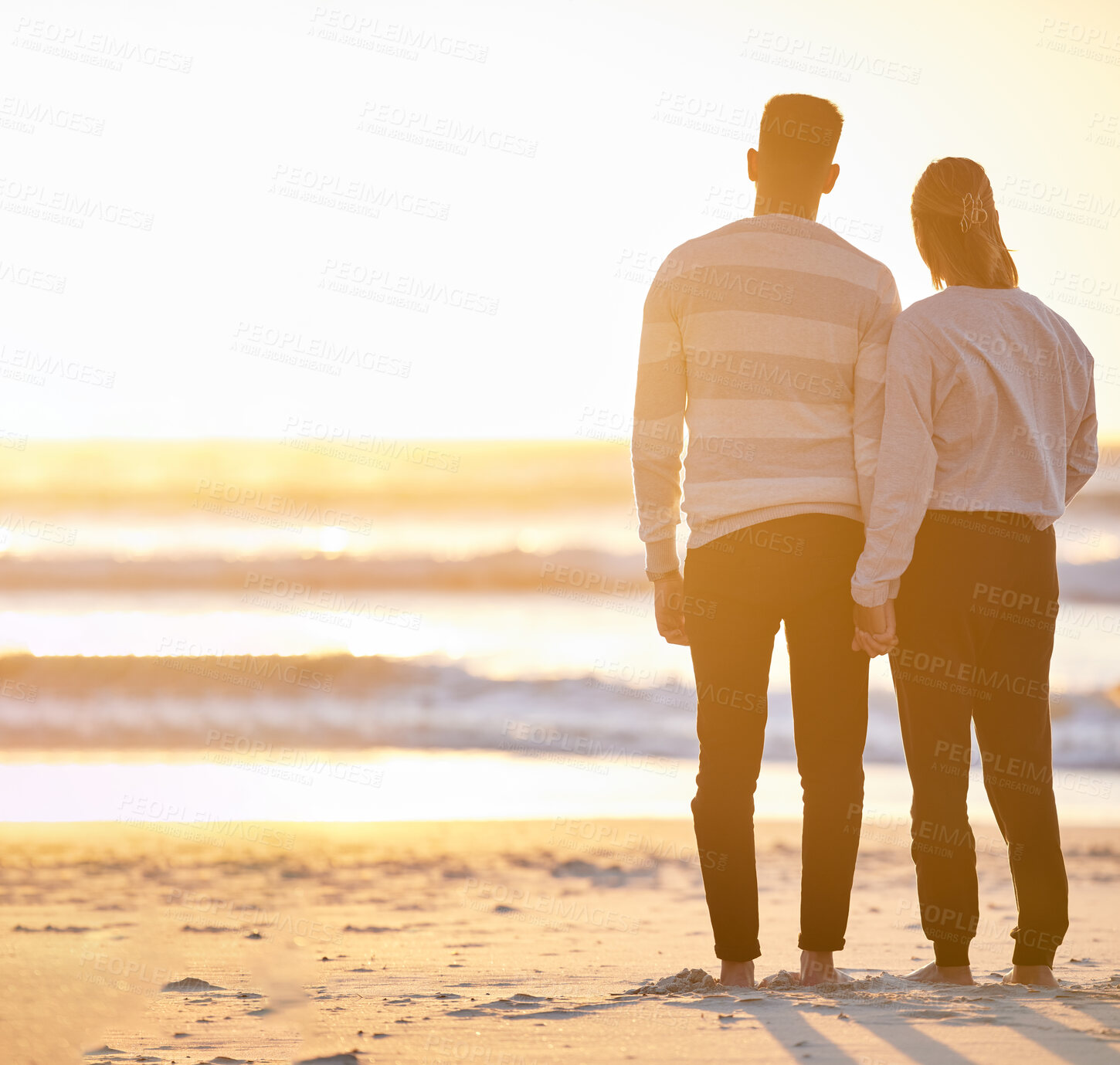 Buy stock photo Couple, beach and holding hands at sunset for love and peace with a calm ocean on vacation. Young man and woman together on holiday at sea to relax, travel and connect in nature for freedom mockup