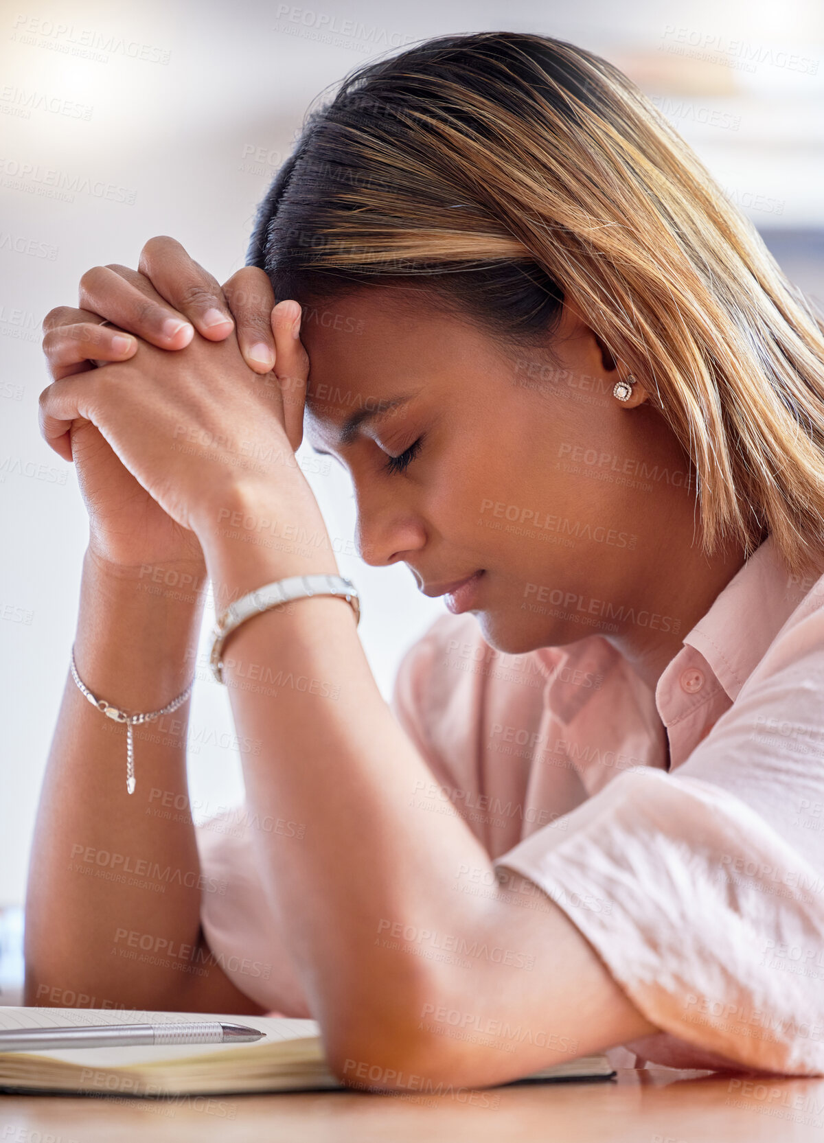 Buy stock photo Praying hands, black woman and book for religion, faith and god help, holy support and spiritual guidance in study. Prayer, hope and calm christian person or university student learning and education