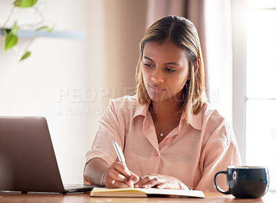Buy stock photo Writing, planning and black woman on laptop for online course, remote university education and research. Young indian person or gen z student on computer and notebook for notes, ideas and e learning