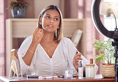Makeup, influencer and woman live streaming with lipstick for beauty, cosmetics and fashion vlog. Content creator, social media make-up artist and girl record, review and filming tutorial on phone
