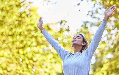Buy stock photo Woman, park and hands open in air for nature, gratitude and self care with mindfulness in sunshine. Gen z girl, stretching and sun worship with gratitude, zen and wellness to start morning with peace