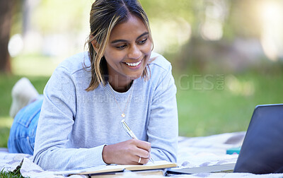 Buy stock photo Student, laptop or notebook writing in park, nature garden or school campus for learning help, studying or education research. Smile, happy or university woman on technology for college scholarship