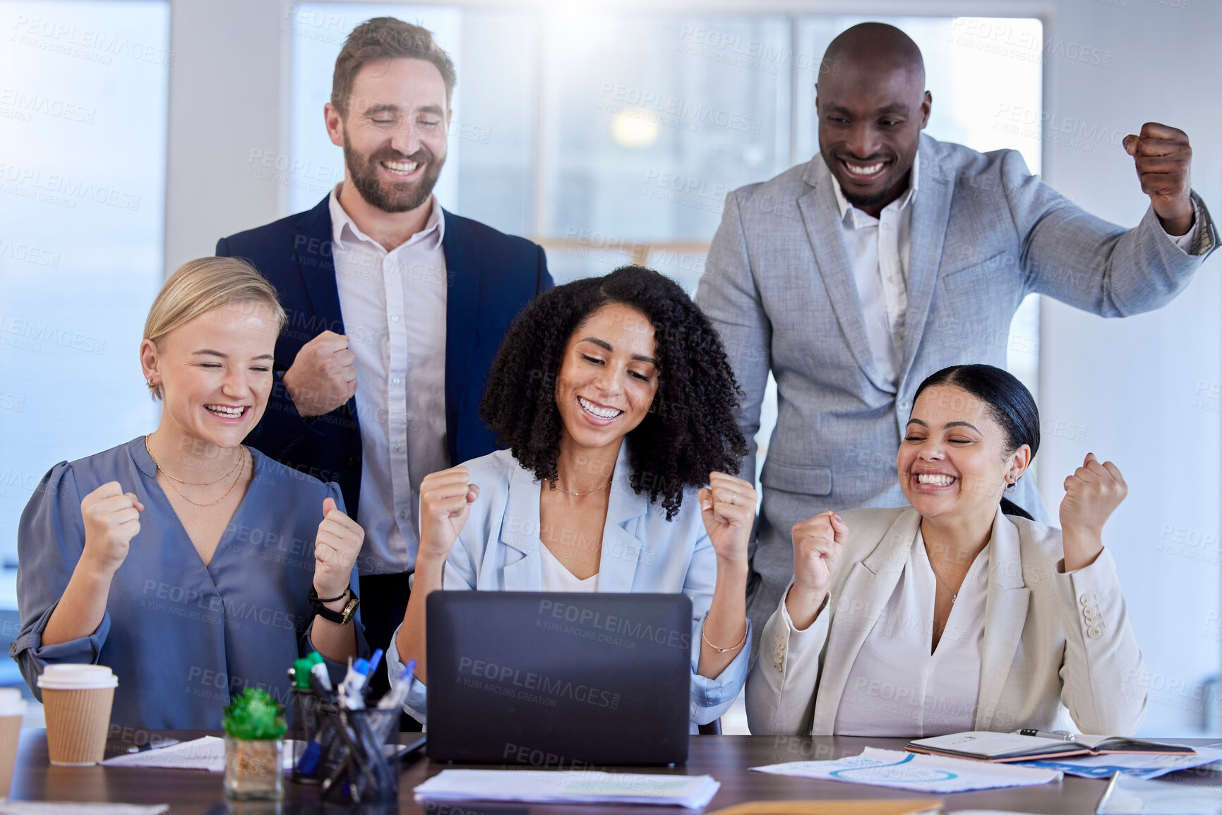 Buy stock photo Business people, laptop and meeting in celebration for winning, promotion or team success at office desk. Group of excited creative employees celebrating teamwork, victory or achievement for startup