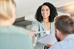 Black woman, leader with business team in meeting, paperwork and presentation with collaboration. Diversity, people and project proposal with speaker, smile with market research in conference room