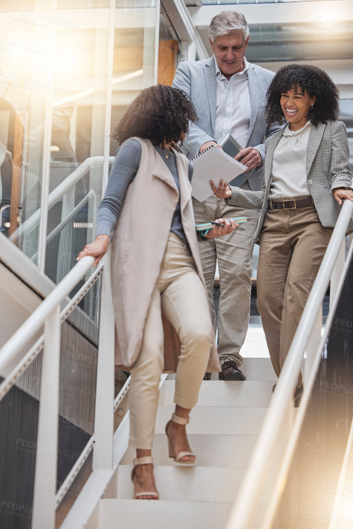 Buy stock photo Discussion, office and business people on stairs walking to meeting for planning, strategy and chatting at work. Teamwork, corporate workplace and happy workers with notebook, documents and report