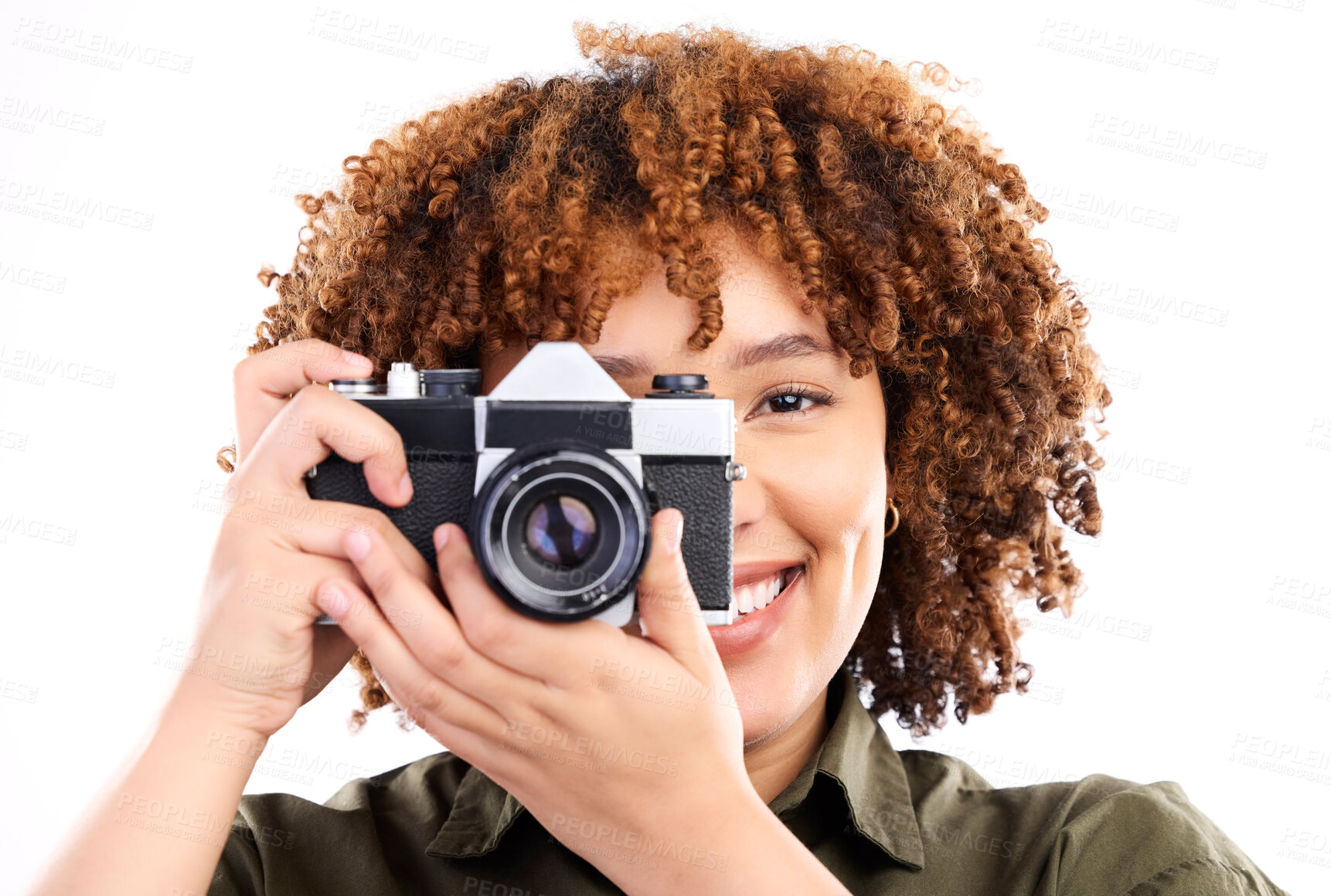 Buy stock photo Camera, black woman and portrait of a young person taking a picture in a studio. Isolated, white background and photography shooting with a female feeling happiness with a smile from creativity