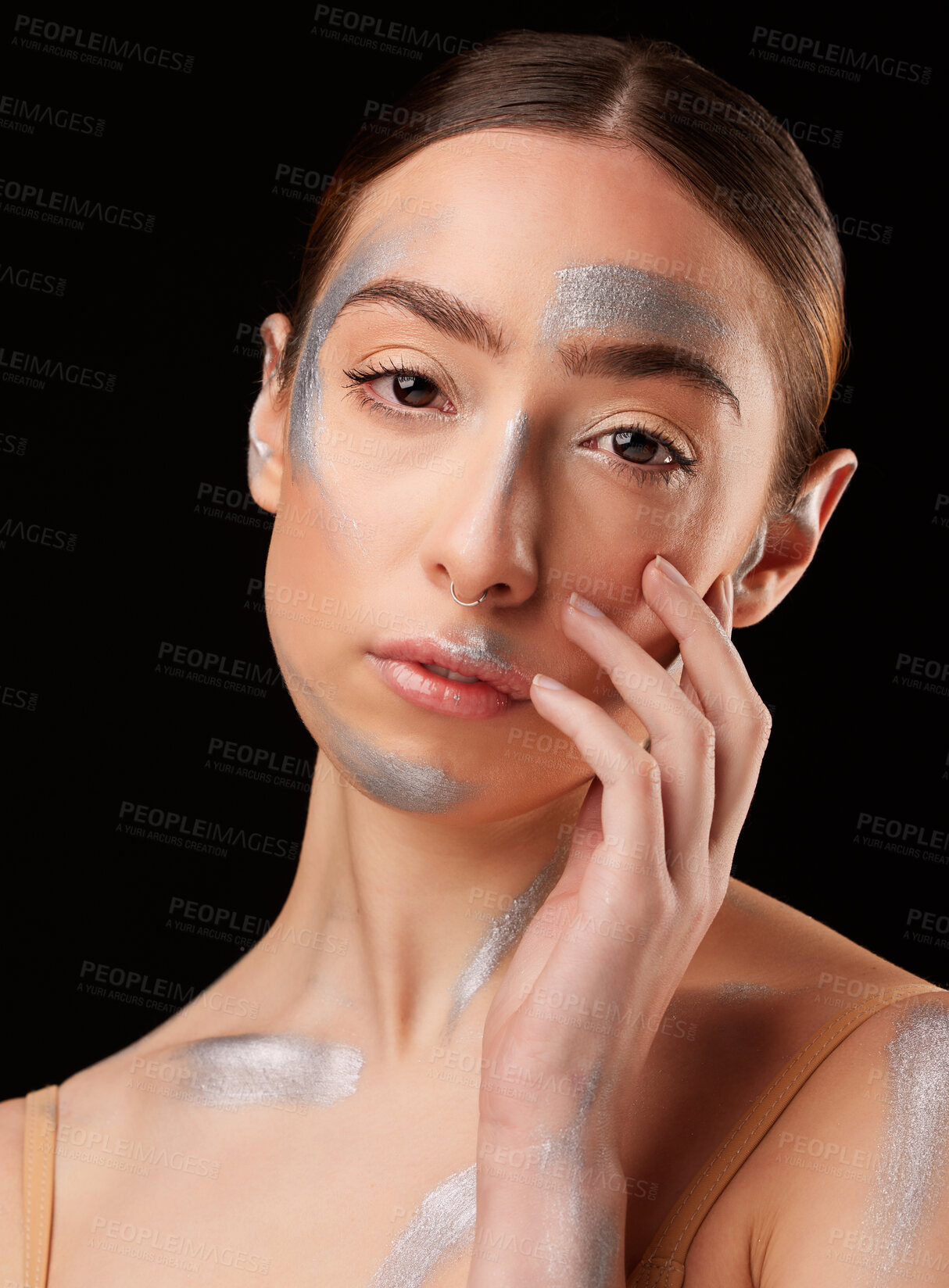 Buy stock photo Beauty portrait, art and woman isolated on dark background for creative artist, cosmetics and face paint. Young model or person headshot in silver, glitter or makeup on skin for creativity in studio