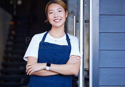 Buy stock photo Happy, cafe and portrait of Asian woman at door for welcome, waitress and entrepreneur in startup. Small business, smile and manager with girl barista in coffee shop for retail, restaurant or service