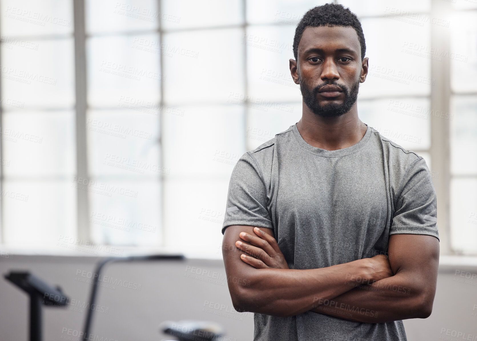 Buy stock photo Black man, portrait and coach in gym with arms crossed for training, exercise and workout in Nigeria. Serious bodybuilder, personal trainer and male in fitness club ready for coaching sports wellness