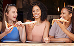 Woman, friends and smile for pizza, food or eating at restaurant together in friendship. Happy hungry women smiling and relaxing on fun date, socializing or bonding at cafe enjoying Italian meal