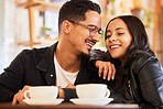 Couple, love and coffee shop date by people in a restaurant or cafe together bonding and funny conversation. Flirting, romantic and boyfriend relax with girlfriends on weekend break and talking