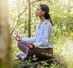 Zen, meditation and woman in nature or forest calm in peace, spiritual and doing yoga for awareness and faith. Mindful, woods and female person relax in green trees for wellness and health lifestyle