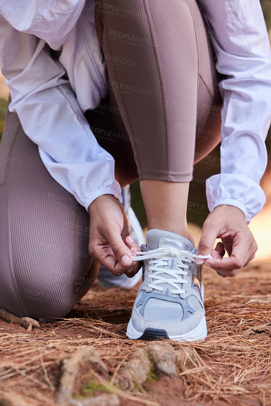 Buy stock photo Fitness, runner or hands tie shoes to start workout, sports exercise or cardio training with running footwear. Legs, nature or healthy girl with commitment or motivation ready for exercising wellness