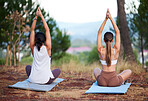Yoga women, outdoor and meditation in nature for fitness, exercise and wellness. Friends together in a forest for a workout, training and energy for mental health, peace and zen with hands in prayer