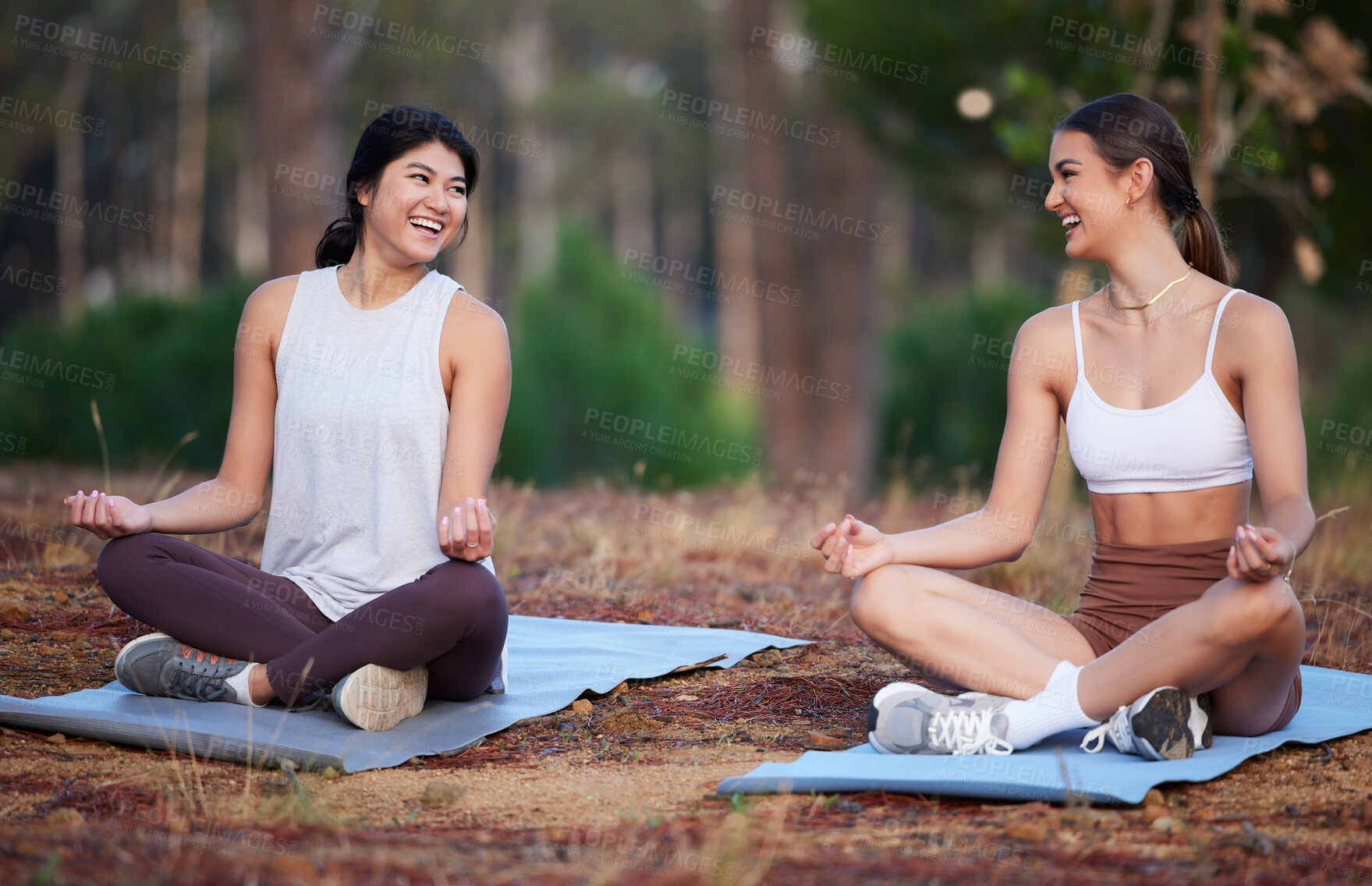 Buy stock photo Meditation, nature yoga and women exercise outdoor for fitness, peace and wellness. Friends on forest ground laughing for lotus workout and energy for mental health, chakra and zen mind or time