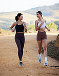 Friends, running and women on trail for fitness, workout or exercise together for health and wellness happy and active. People, cardio and female athletes run on a mountain bonding and training
