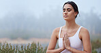 Yoga, prayer or zen woman in nature for spiritual meditation, peaceful or worship gesture outdoors. Fitness, lotus or healthy girl relaxing in balanced exercise to meditate with mindfulness freedom