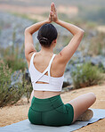 Yoga, lotus or zen woman on mountain for spiritual meditation, calm freedom or gratitude in nature. Fitness, prayer or healthy girl relaxing in balanced exercise to meditate on mindfulness back view