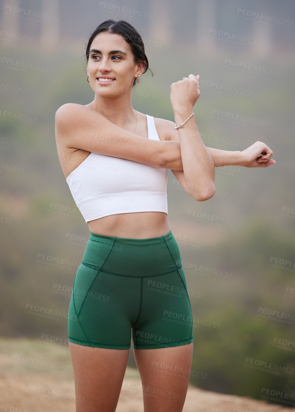 Buy stock photo Fitness, woman stretching in mountains in exercise body training for balance, fresh air in healthy lifestyle. Female athlete, smile or happy sports girl in arm stretch workout or warm up for running