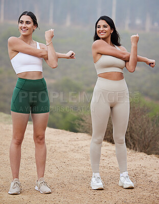 Buy stock photo Fitness, women and stretching in mountains, exercise and training for balance, fresh air and healthy lifestyle. Female athletes, friends or happy girls stretch arms, workout or warm up for motivation