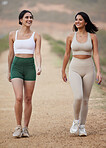 Fitness, friends or walking in mountains in hiking exercise workout or trekking training in healthy lifestyle. Athlete girls, women or happy people talking, speaking or laughing to relax in nature