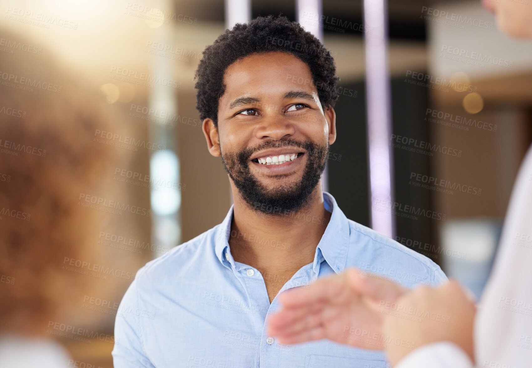 Buy stock photo Meeting, attention and learning with a business black man listening to a manager talking in the office boardroom. Face, planning and education with a male employee in a training workshop or seminar