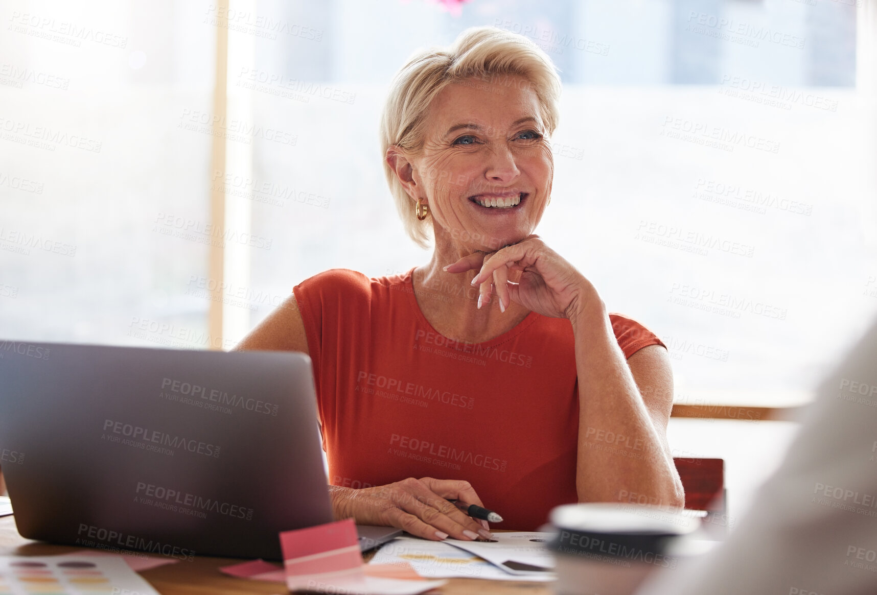 Buy stock photo Laptop, thinking and management with a senior woman in business, sitting at a table in the boardroom. Computer, thinking and smile with a happy female in leadership working alone in her office