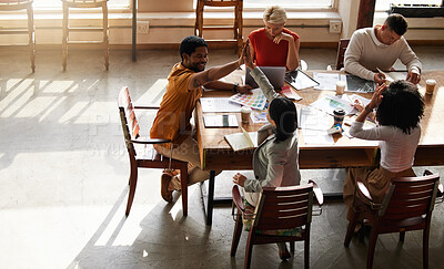 Buy stock photo High five, creative startup and people success in project teamwork, collaboration or planning ideas at office table. Diversity employees, digital graphic design and hands together for career support