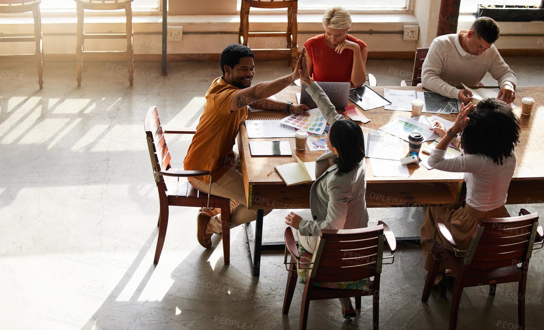 Buy stock photo High five, creative startup and people success in project teamwork, collaboration or planning ideas at office table. Diversity employees, digital graphic design and hands together for career support