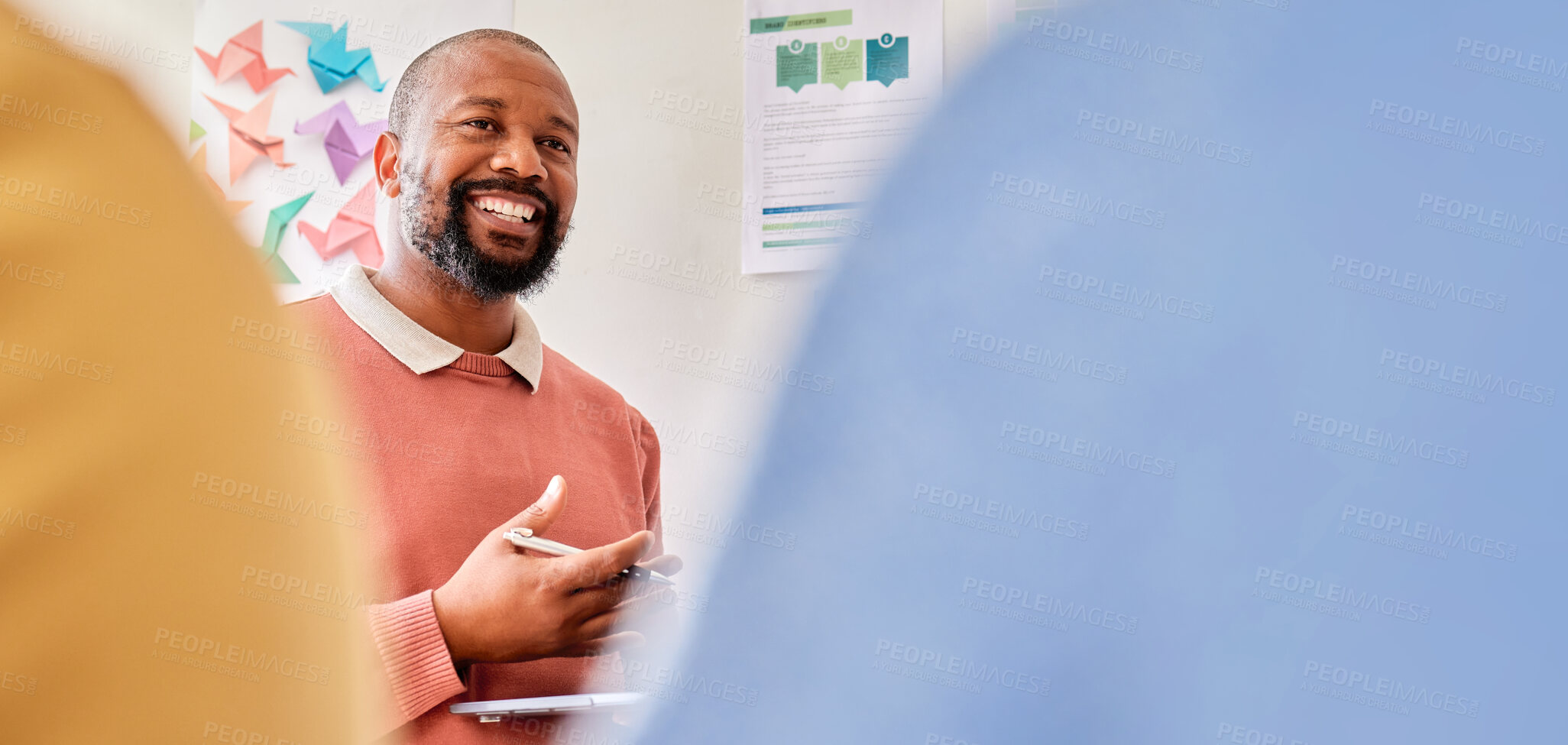 Buy stock photo Planning, creative meeting and black man with startup brainstorming, speaking to clients or b2b communication. Happy designer, person or manager talking of business plan, project development and idea