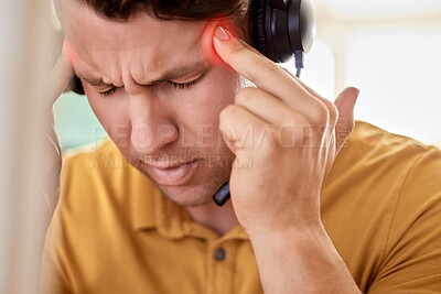 Buy stock photo Stress, call center and man with headache, burnout and overworked with pain, overtime and exhausted. Male employee, customer service or consultant with migraine, telemarketing or anxiety in workplace