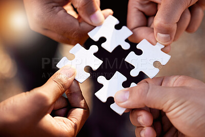 Buy stock photo Group hands with puzzle for solution, teamwork and workflow goals, achievement and success in closeup. Team building game, project development and people for problem solving, synergy or collaboration