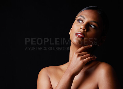 Skincare, beauty and face of a woman with space in studio for makeup, cosmetics and dermatology on skin. Young aesthetic model person on black background for luxury self care, facial glow and mockup