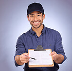 Delivery, signature and portrait of Asian man with paperwork isolated on a studio background. Happy, showing and courier asking to sign a document for approval of a service, import or package