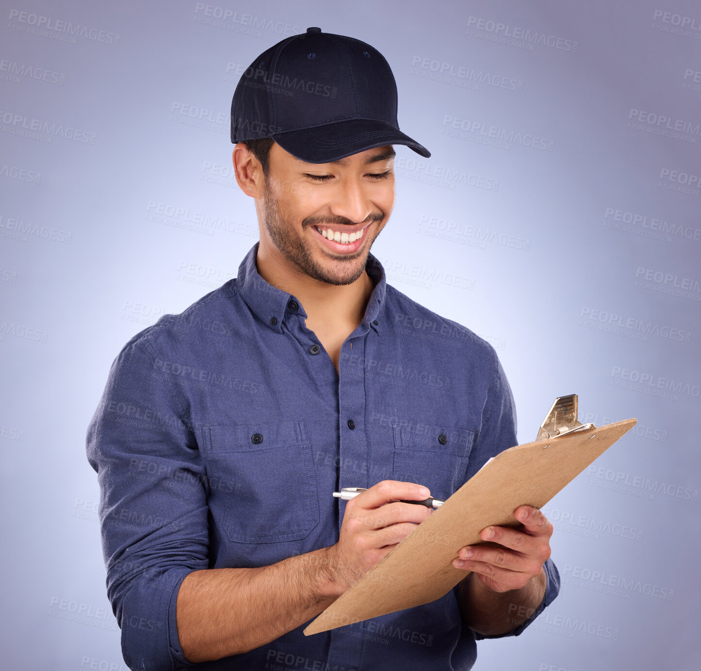 Buy stock photo Man, studio and writing on clipboard working on delivery, shipping and logistics with hat and smile. Happy asian model person or worker on checklist, list or form for information on purple background